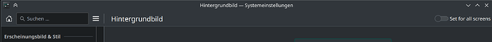 KDE Settings->Background Image